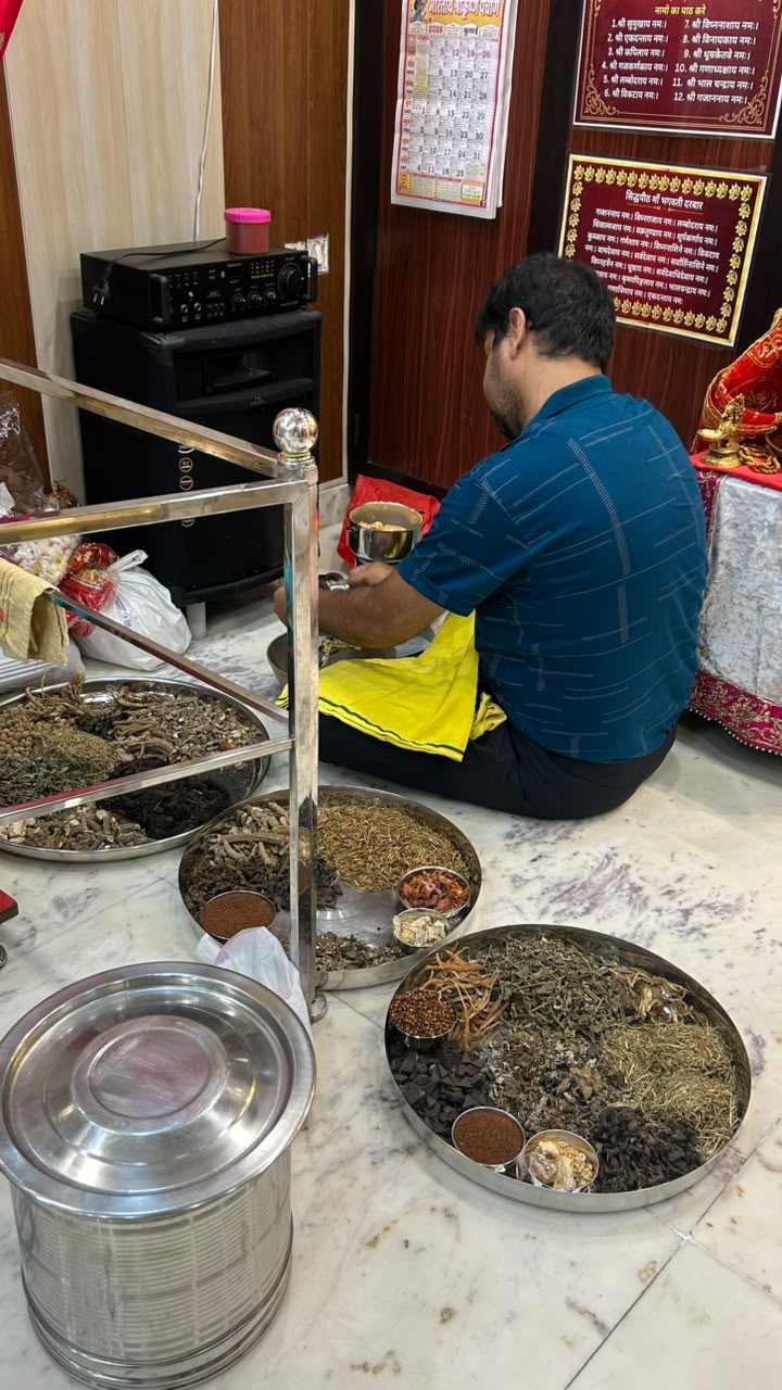 Grinding the sacred Dhoop mixture